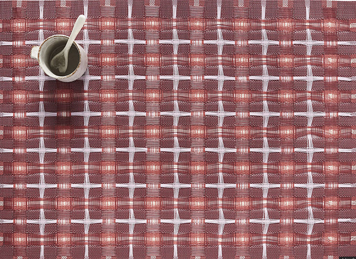 Chilewich placemat Hopscotch Sangria, top view with cup, woven diamond pattern