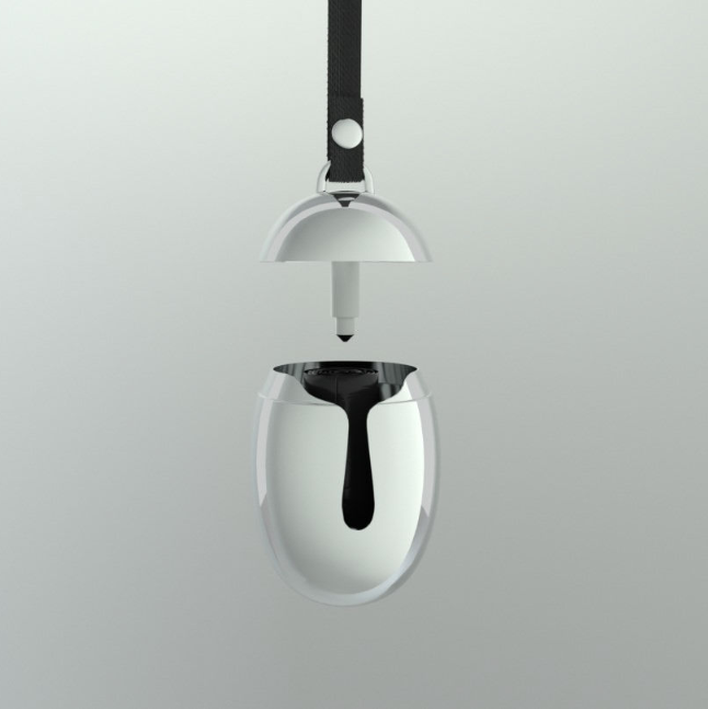 Alessi Acino dispenser voor pet-afvalzakjes in rvs, geopend met zakje zichtbaar