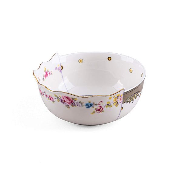 Side view of Saylac bowl by Seletti, with floral decoration and gold accents