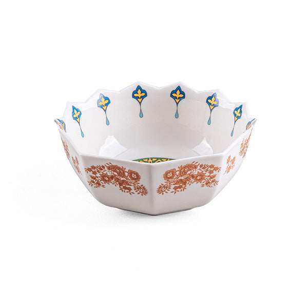 Seletti bowl from the Hybrid series, with orange floral motif and scalloped rim