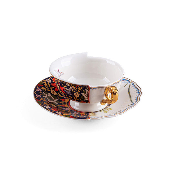 Cup and saucer at an angle from above, with asymmetric rim in two designs