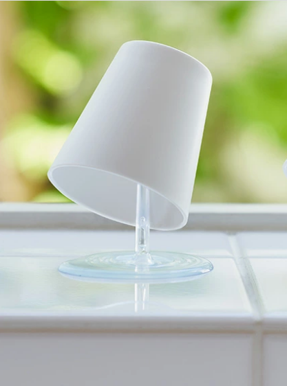 Spare Oh!! mug on stand, close-up on windowsill