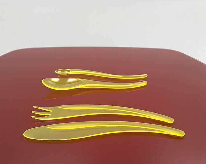 Alessi Zlin bestekset met mes, vork, lepel en longdrink lepel, in geel