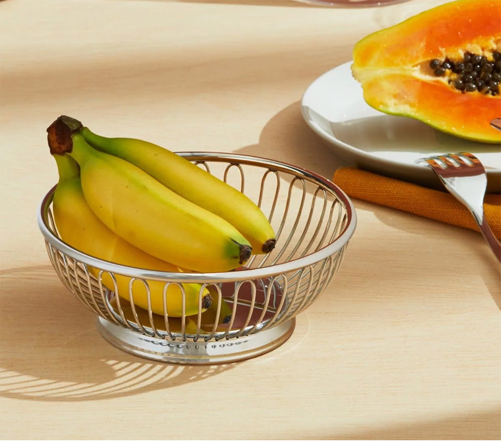 Alessi ronde broodmand, roestvrij staal, met bananen voor ontbijt