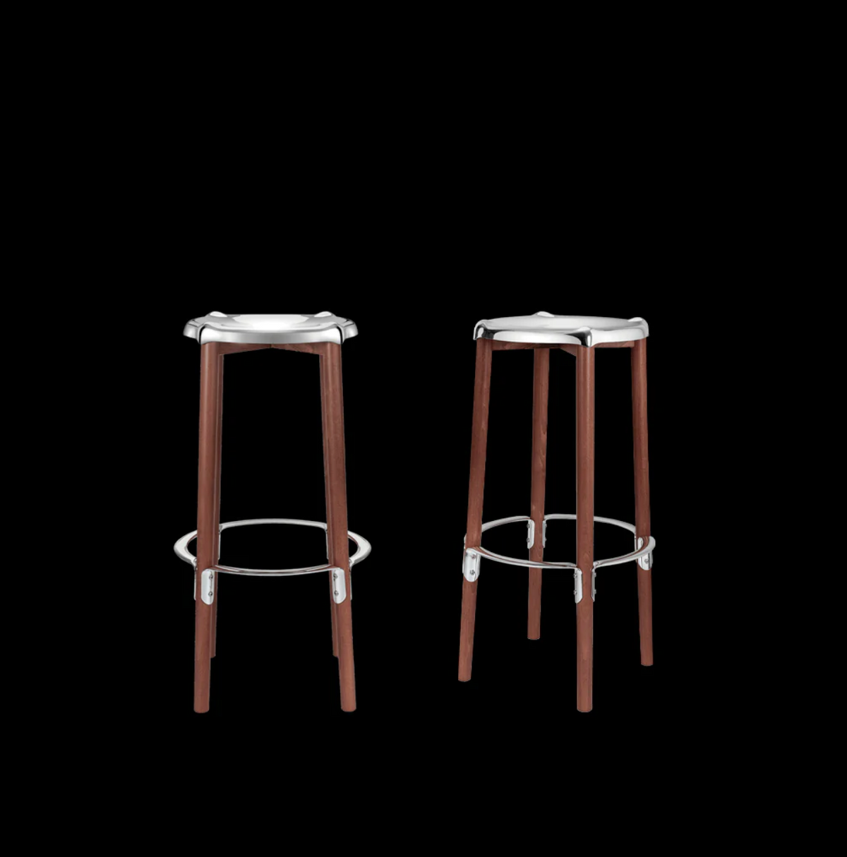 Two Alessi Poêle bar stools side by side, with steel seat and wooden legs