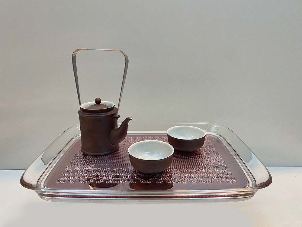 Kartell Teatime Rosa tray in pink plastic with Asian tea set