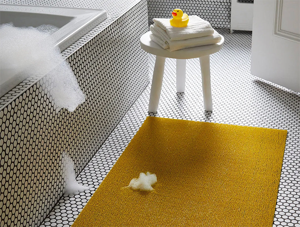 Detail van deurmat Solid Canary, geel, close-up van het geweven materiaal