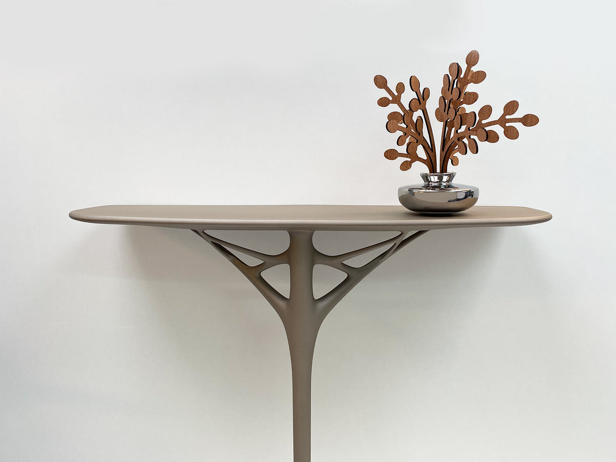 Kartell A.I. Console in grey on wall, with vase as decoration
