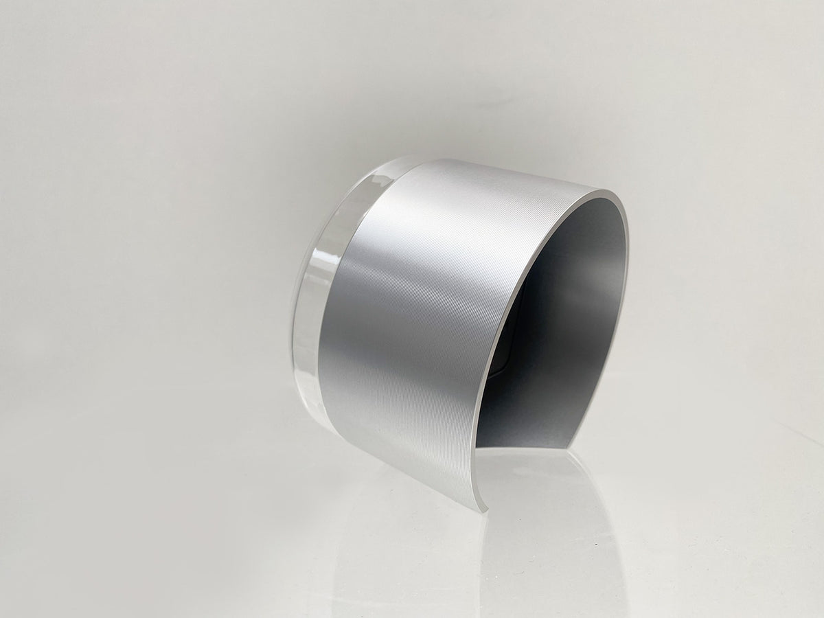 Zijaanzicht van de aluminium cilinder van de Ento analoge wekker LGN