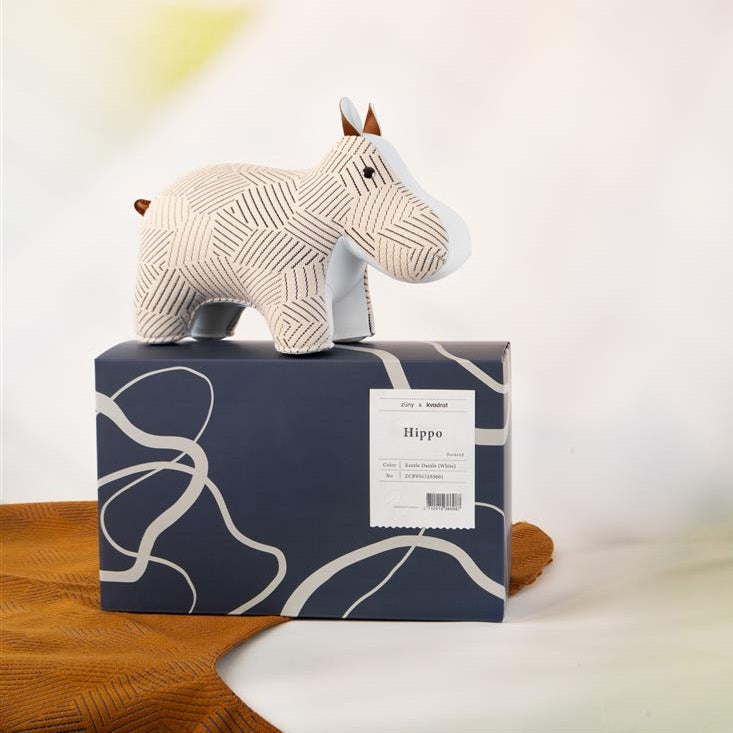 Zuny hippo bookend in white, with matching packaging