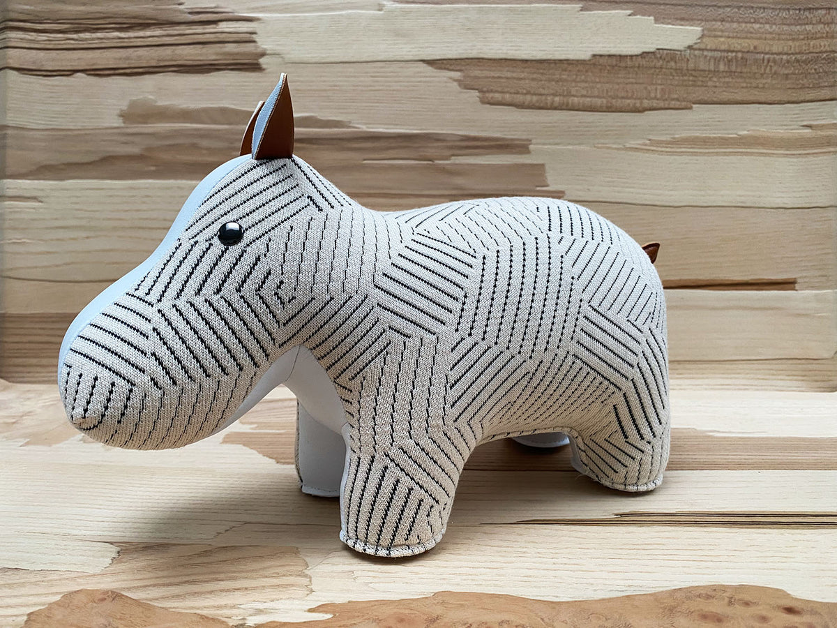 Zuny hippo bookend in white, stripe pattern detail