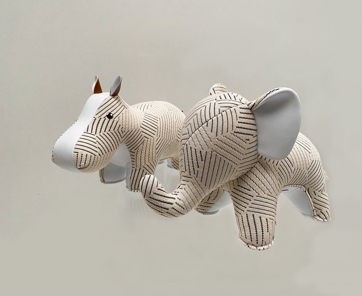 Zuny bookend elephant white next to rhino in same fabric