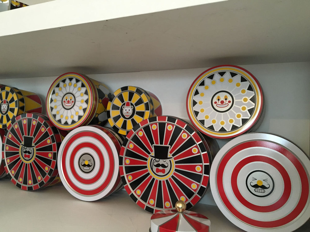 Various CIRCUS storage jars side by side in various designs and colours
